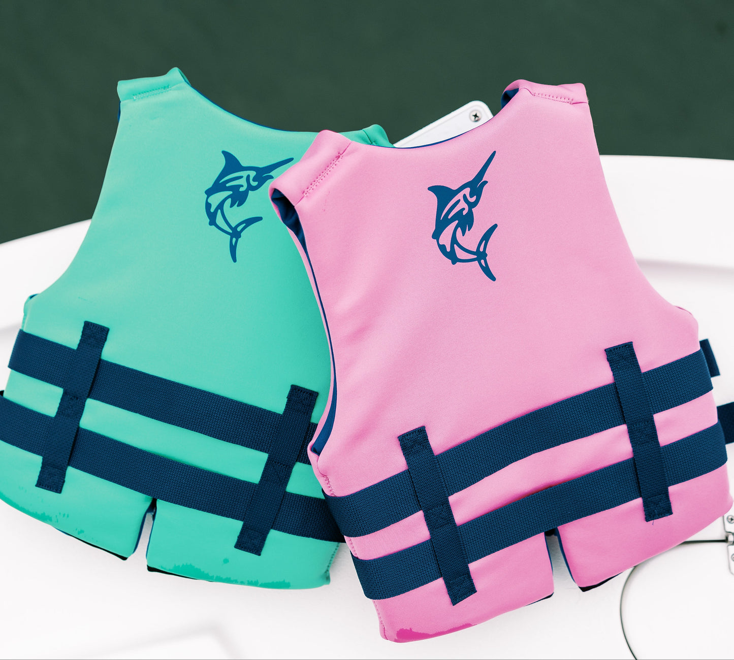 youth life jacket pink and green